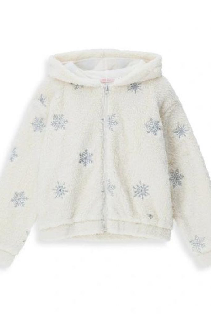 Top en fausse fourrure du club de ski